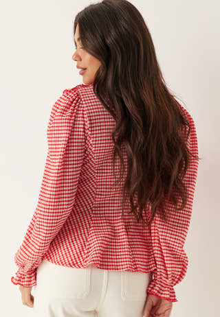 Jersey  Frill Peplum Blouse