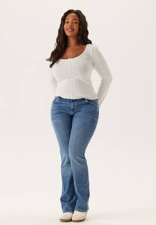 Low Bootcut Flap Jeans