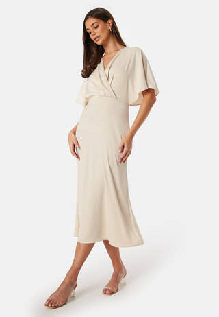 Formal Beige dresses at the outlet | Buy women's formal dresses from our outlet Formal Beige dresses at the outlet | Buy women's formal dresses from our outlet