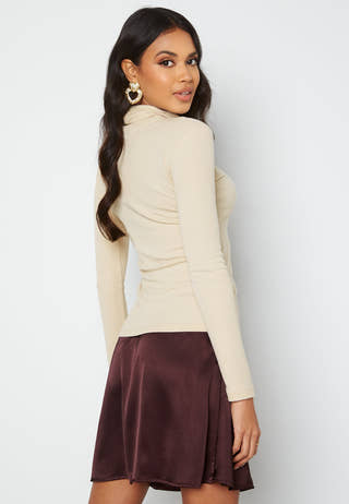 Sarika Turtleneck Top