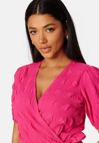 Triniti ss wrap blouse