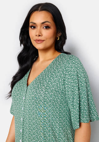 Malini button frill dress