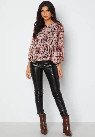 Skye 3/4 Peplum Top